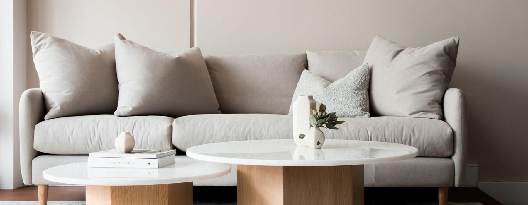 a white couch with a coffee table