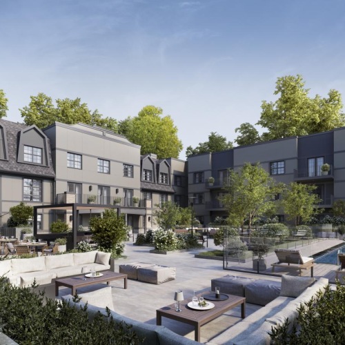 a building with trees and a pool and a courtyard