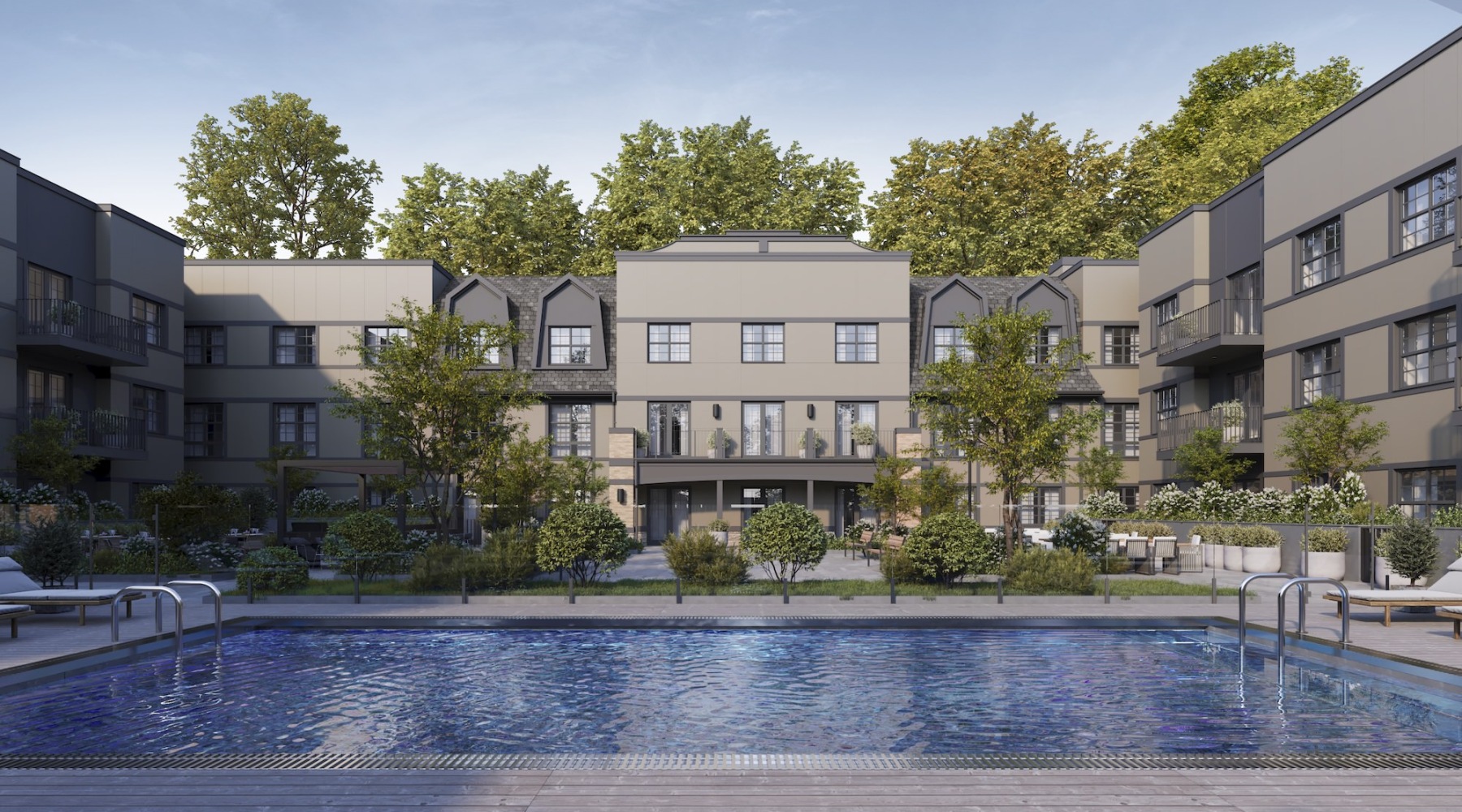 Resort-style swimming pool with lounge seating